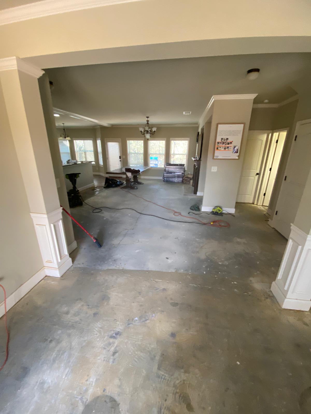 Unit interior before and after plank flooring installation