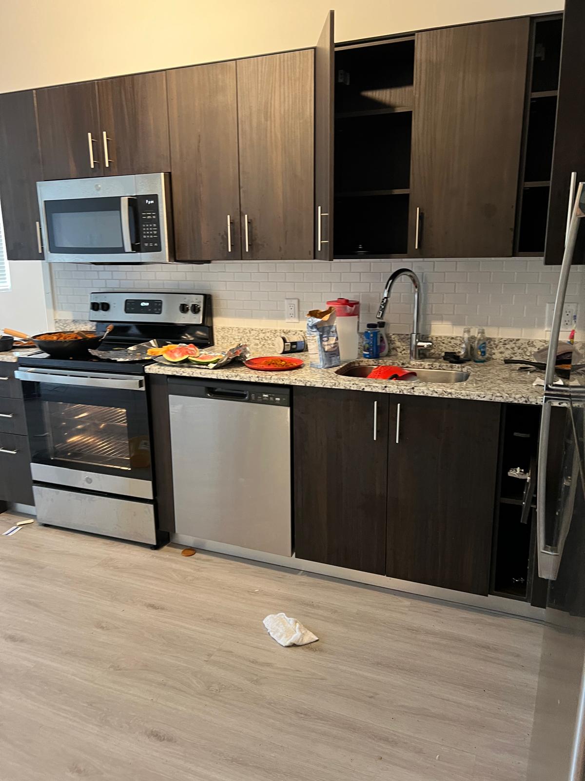 Apartment kitchen before and after a multi-unit make-ready turn