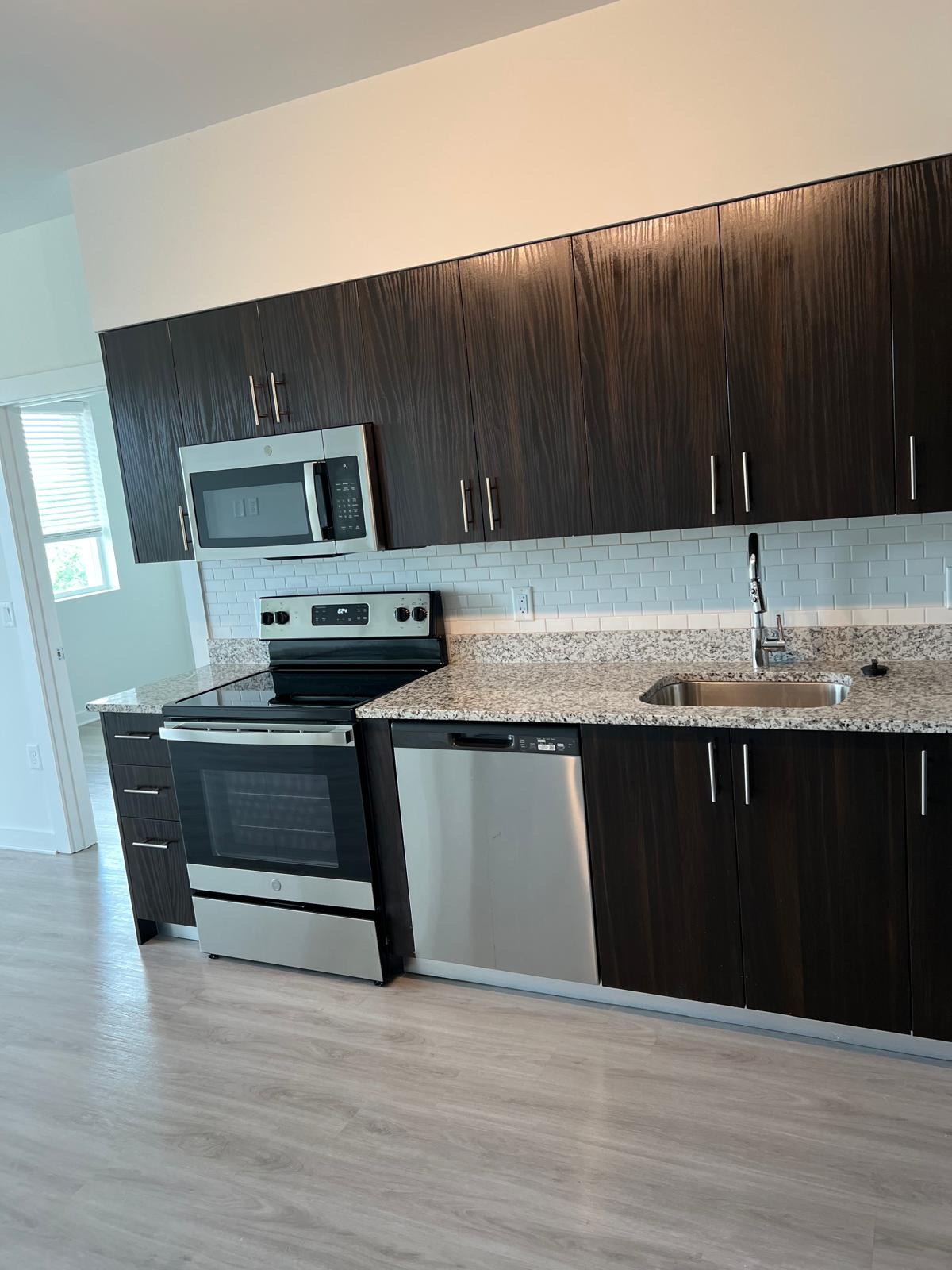Apartment kitchen before and after a multi-unit make-ready turn