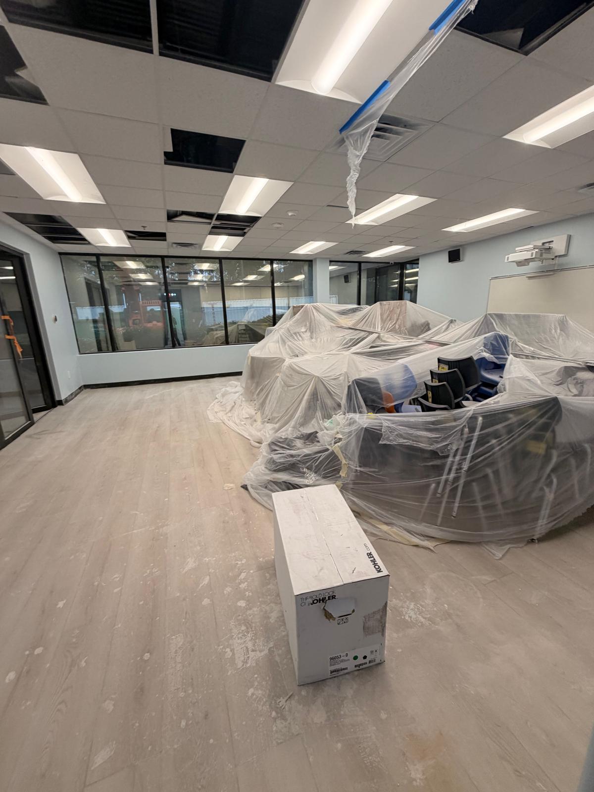 Commercial office space before and after post-construction cleaning