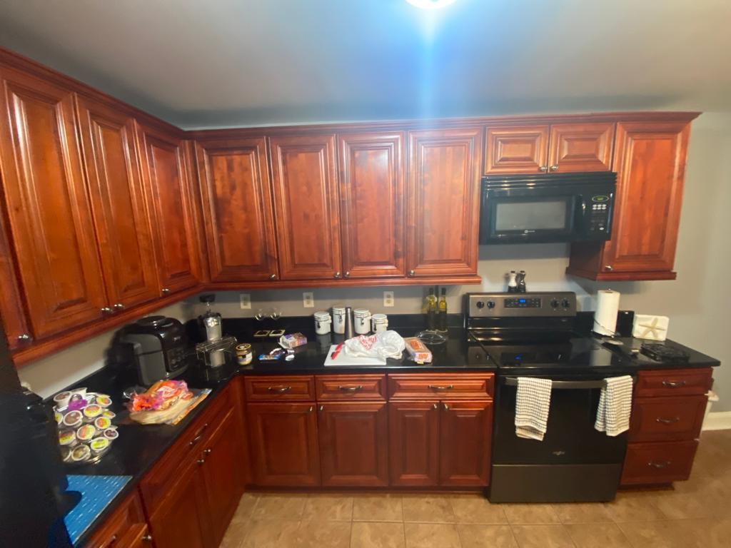 Apartment kitchen cabinets before and after painting